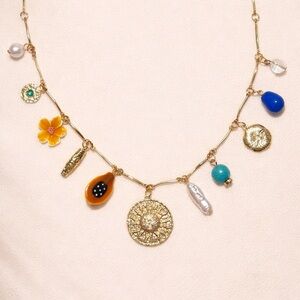 NEW Gold Tone Charm Necklace with Sun Medallion, Pearl & Turquoise Blue Accents